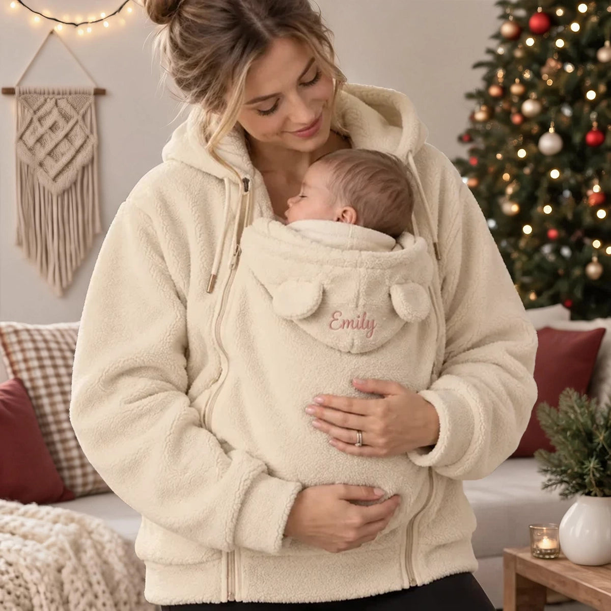 Personalized Embroidered Fleece Babywearing Hoodie, Mom Cuddling Baby in a Christmas Living Room, Unique Gift