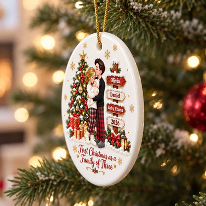 Personalized First Christmas Ceramic Ornament, Parents Cuddling Baby by a Christmas Tree, Creative Gift for New Parents