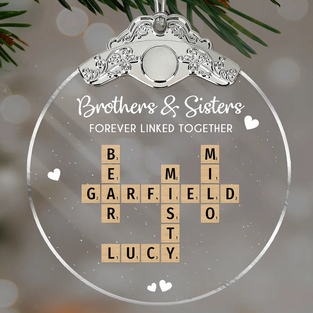 Silver Capped Glass Ornament with siblings crossword tiles, cozy tree display, warm family keepsake, gift-ready decoration for Christmas gatherings