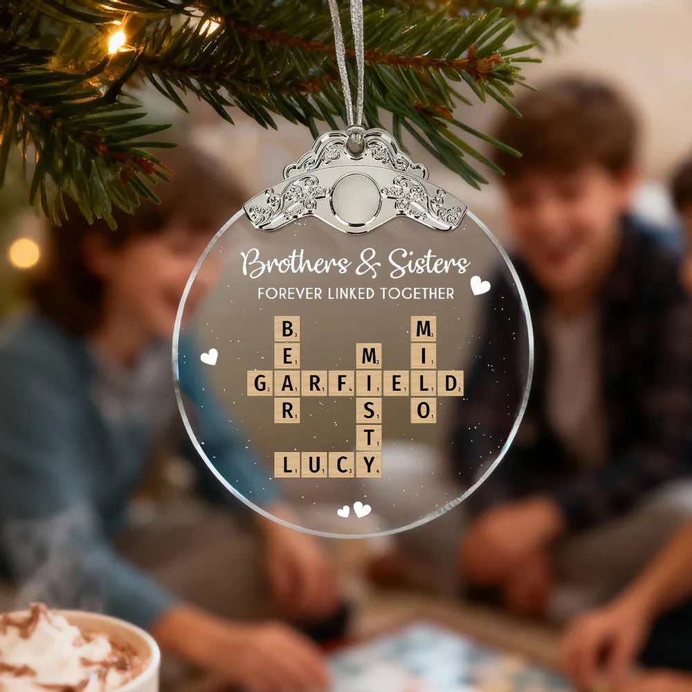 Silver Capped Glass Ornament with siblings crossword tiles, cozy tree display, warm family keepsake, gift-ready decoration for Christmas gatherings