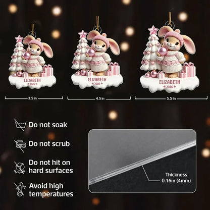 Personalized Acrylic Ornament, Pink Bunny Holding a Bauble by a Snowy Christmas Tree, Unique Gift for Kids