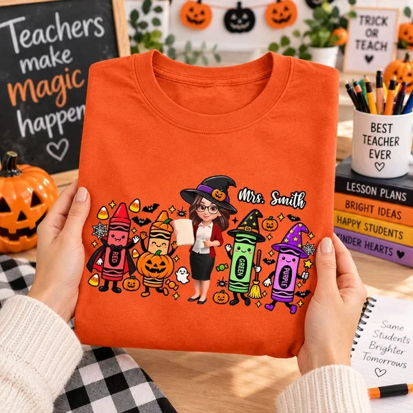 Classic Tee, Colorful Witchy Crayons & Teacher Holding a Lesson Sheet, Creative Halloween Gift for Teacher Friends