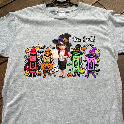 Classic Tee, Colorful Witchy Crayons & Teacher Holding a Lesson Sheet, Creative Halloween Gift for Teacher Friends
