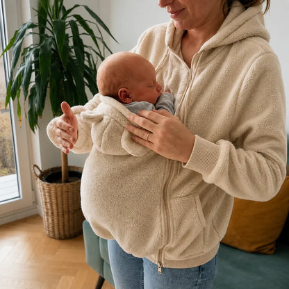 Personalized Embroidered Fleece Babywearing Hoodie, Mom Cuddling Baby in a Christmas Living Room, Unique Gift