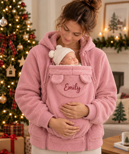 Personalized Embroidered Fleece Babywearing Hoodie, Mom Cuddling Baby in a Christmas Living Room, Unique Gift