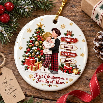 Personalized First Christmas Ceramic Ornament, Parents Cuddling Baby by a Christmas Tree, Creative Gift for New Parents