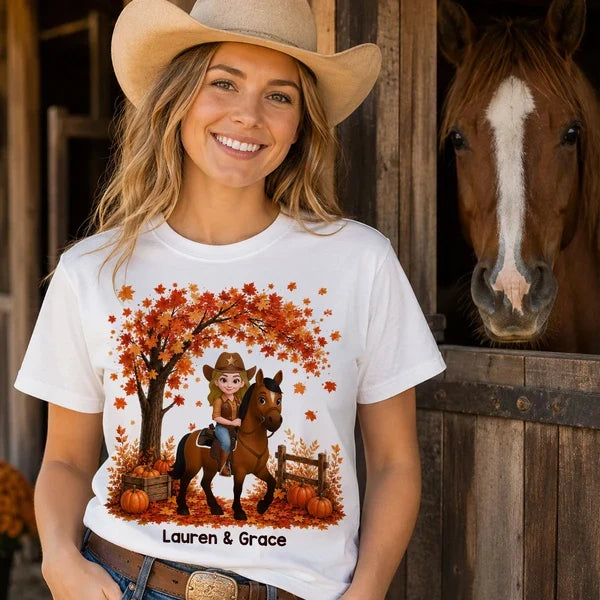 Personalized Classic Tee with Cartoon Cowgirl Riding a Horse in an Orange Fall Scene, Creative Gift for Horse Lovers