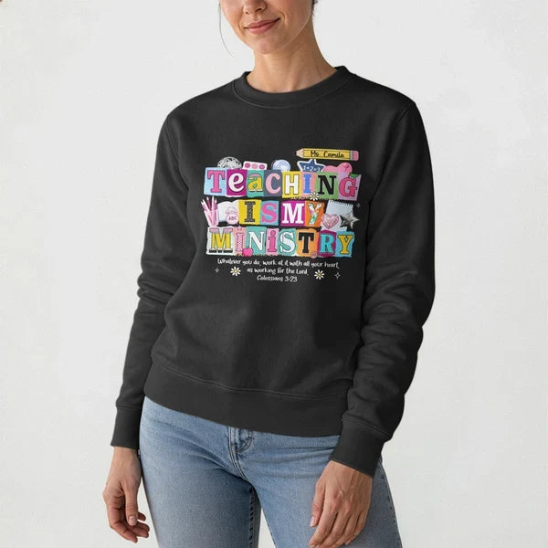 Personalized Classic Tee, Colorful Teaching Is My Ministry Art, Teacher Holding Folders in a Classroom, Unique Gift
