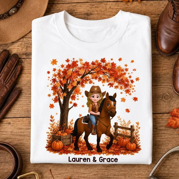 Personalized Classic Tee with Cartoon Cowgirl Riding a Horse in an Orange Fall Scene, Creative Gift for Horse Lovers